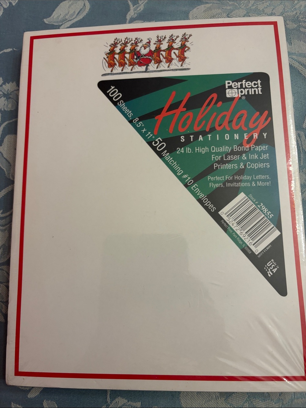 Holiday Stationery - White 100 sheets and 50 envelopes. Reindeer with Santa